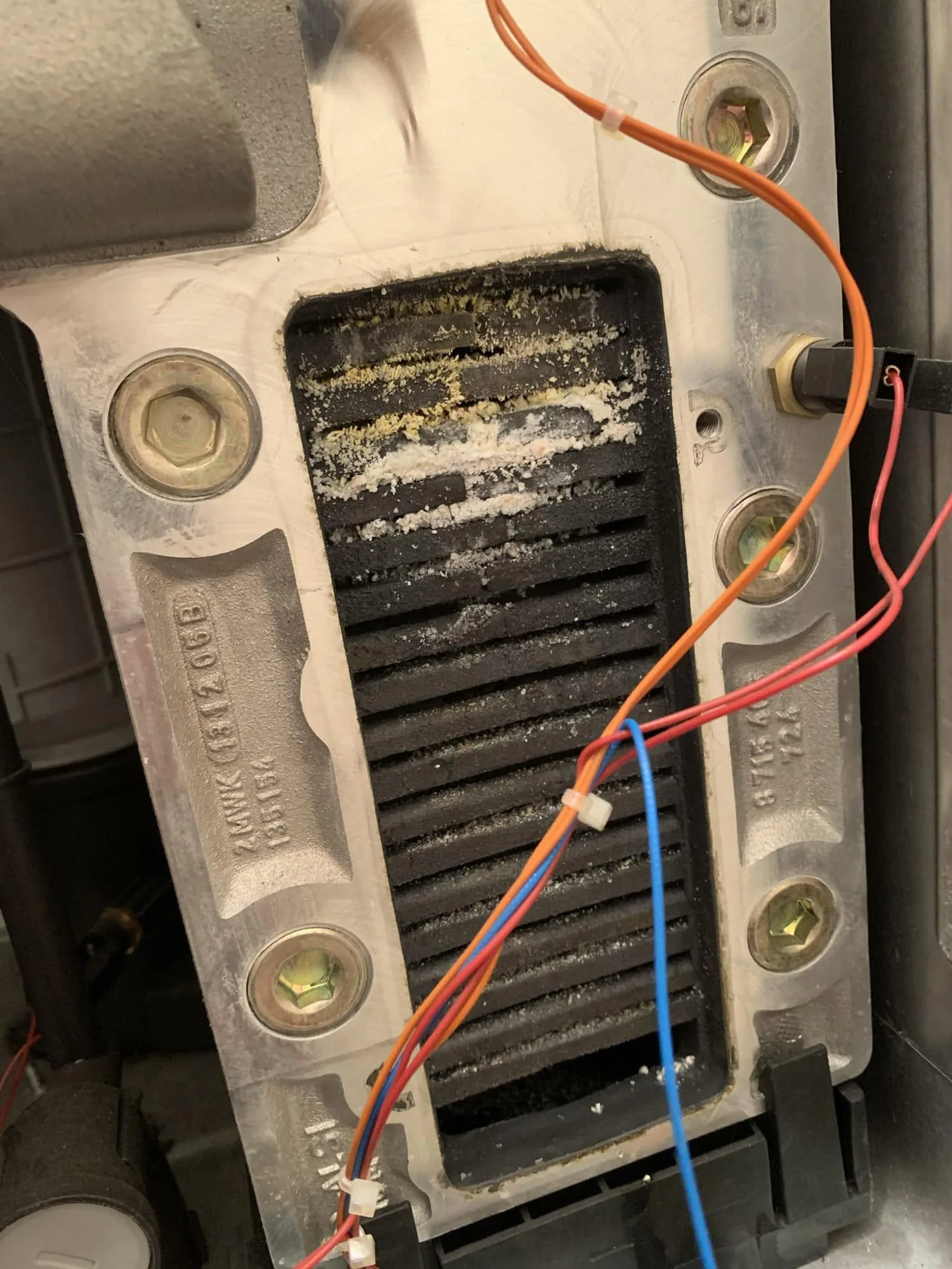 Boiler heat exchanger inspected during an annual boiler service in Stoke-on-Trent